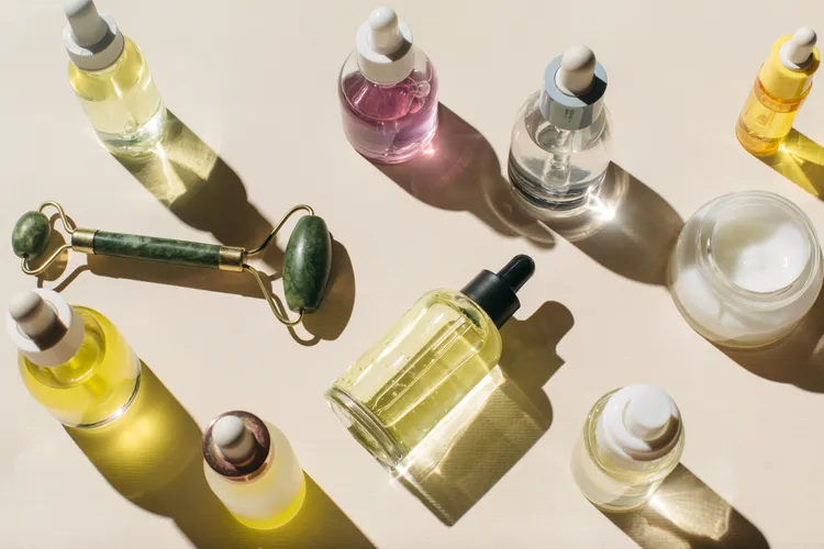 Various skincare products on a surface.